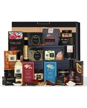 The Hamper Emporium The<br>Ultimate Foodies... Various For gourmet food lovers, this hamper is a must. It's filled with luxurious treats both sweet and savoury from some of Australia's finest producers. Send it as a gift to someone who simply adores sweet nibbles, savoury delights, and pantry essentials galore. It's perfect for entertaining or sharing with loved ones. Beautifully presented in a custom-designed keepsake gift box, you can send this straight to their doorstep as no further gift wrapping is required. It's the ultimate gesture. Due to se
