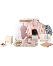 The Hamper Emporium<br>L'occitane Rejuvenate &... This pretty pink hamper is Australia's best pamper hamper and because it's spoiled thousands of Aussie women, you can rest assured knowing your gift recipient will love it.<br>What's in the box? We adore the French beauty brand L'Occitane and this hamper carries the hand cream and soap from their cherry blossom line. It pairs beautifully with a satin robe, a Mulberry silk eyemask, the scent of a vanilla and sea salt candle, and a French bath soak. We've even added some sweet bites to be enjoyed