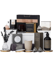  The Hamper Emporium<br>Exquisite Homewares...  It's the little things that turn a house into a home and this hamper into the ultimate gift for a homebody. Once they open it, they'll be lounging around in pure bliss with luxury homewares, from a hand-poured scented candle to stunning white marble coasters and more surprises. Whether you're looking for a settlement or housewarming gift, this hamper is perfect for celebrating the start of something wonderful.<br>Due to popular demand and seasonal variation, hamper contents may vary.