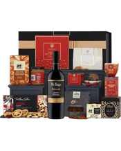  The Hamper Emporium<br>Christmas... 750ML Treat them with pure gourmet goodness this festive season. This indulgent hamper features the Binbrook Barossa Shiraz from Mr. Riggs. A delicious red with classic Barossa boldness, it’s ideal for sharing around the Christmas table this year. They will also receive a delicious assortment of artisan treats, from The Woods Farm’s home-style festive classics to exclusive nibbles from Maggie Beer. Each delectable item has been carefully selected to make their holiday season unforgettable.