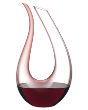  Riedel Amadeo Rosa Decanter  1500ML Pink colour is applied to large areas of the Decanter Amadeo rosa, giving it a new, modern aesthetic. Ever since it was introduced to the market in 2006, the Amadeo Decanter, designed by Stefan Umdasch, has been one of the icons of Riedel’s collection. As a limited edition the Amadeo is available in three colours: Amadeo Menta (a shade of green), Amadeo Grigio (grey) and Amadeo Rosa. Mouth-blown from crystal glass and handmade in the Riedel factory in Kufstein, these decanters are more than perf