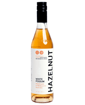  White Possum Hazelnut<br>Liqueur 500ml  500ML White Possum's Hazelnut Liqueur is a rich and decadentliqueur featuring intense nutty flavours with subtle chocolate undertones. Made in Melbourne, this is a modern take on a classic Italian recipe.<br />To make it, the team roasts and crushes 100% Australian hazelnuts grown in Victoria.They also mix in a smattering of organic cacao nibs to lenda little ‘chocolatey’ edge to this nutty paste. The paste is then infused patientlyin spirit to slowly extract all the flavourful oils. Finally, an infus