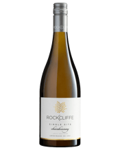  Rockcliffe Single Site<br>Chardonnay 2019  750ML This wine has a brilliant straw green colour. A full aroma with a hint of nuttiness and delicate stone fruit combines with peach and grapefruit on the palate, balancing a natural acidic finish.