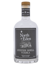  North Of Eden Oyster Shell<br>Vodka 700ml  700ML This triple distilled, traditional vodka has been created using a world-first process. Hundreds of locally sourced oyster shells are carefully placed in the columns of our two small copper alembic stills to replicate the purifying power of a much larger column still.<br>Producing only 400 hundred bottles at a time, the result is a beautifully smooth unfiltered vodka that retains all the flavour characteristics of the base wheat spirit.<br>Smooth enough to drink straight, this vodka is a ground-b