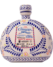  La Cofradia Talavera Azul<br>Reposado Tequila... 750mL Talvera Azul Reposado Talavera takes its name from the pattern of the design painted onto the bottle. The tequila is an authentic taste and quality of 100% agave which is a delight to the palate. Talavera holds the Super-Premium quality of Cofradia Tequila, which is aged in wooden barrels for 6 months.&nbsp; The bottles are hand made then baked in an oven to create individual ceramic containers. A group of Artisans co-operate to bring together the components being bottle, product and artwork on each