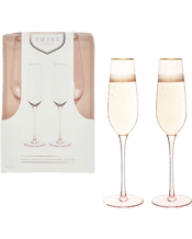  Twine Rose Crystal Champagne<br>Flute Set   Life looks a lot rosier when you sip from these gold-rimmed glasses. Tinted a delicate pink, these crystal glasses are the perfect vessels for your favorite bottle of bubbly. Crafted from rose tinted crystal Electroplated gold rim Makes a great gift.
