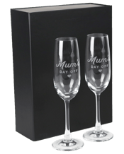  Personalised Favours Gift<br>Boxed Twin Champagne...  Take your champagne toasts to the next level with these elegant, tapered stem champagne glasses.&nbsp; Made from premium European glass, each is safely packaged inside a stylish black gift box. Each glass has been carefully laser engraved with the text 'Mum's Day Off'&nbsp; Measurements:-&nbsp; Champagne Glasses - (5 diameter x 23.5h cm).