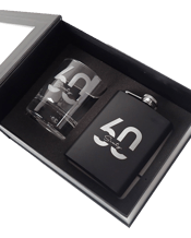  Personalised Favours Black<br>Hip Flask & Scotch...  This set includes one 305ml round scotch glass and one 7oz black stainless steel hipflask inside a stylish gift box.&nbsp; Both are carefully engraved with the text 60 Sixty.&nbsp; Measurements:-&nbsp; Scotch Glass - 8d x 9.3h cm (Holds 305ml) Hip Flask - 9w x 12.5h cm (Holds 7oz)&nbsp; Gift box - 23.5w x 10d x 17.5h cm
