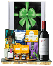  Hamper World Penfolds Bin 28<br>Shiraz Gourmet... 750ML This Gourmet Hamper contains 1 bottles of alcohol and 9 food products and is packaged in a Medium White Gift Box which is Finished with a Seasonal Event Sleeve.<br />Penfolds Bin 28 Shiraz 750ml<br />Mount Zero Marinated Olives 80g<br />Beerenberg Fig and Pomegranate Jam For Cheeses 190g<br />Beerenberg Mini Jam 30g<br />Beerenberg Mini Jam 30g<br />OB Finest Fig and Pistachio Crackers 130g<br />Charlies Three Cheese Bites 60g<br />Piranha Cashew & Soy Snack Mix 80g<br />Good Nuts Beer Nuts 30g<