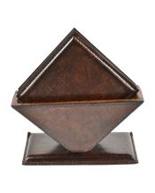Kundra Leather Square<br>Coaster 6 Pcs 1EA Embossed in rich, harnessed leather, embrace quality texture for your coaster requirements. A set of 6 square coasters to add debonair to your décor vibe for all days of the week.<br>Available in Dark shade.