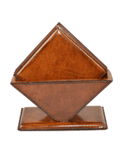 Kundra Leather Square<br>Coaster Set 6 Pcs 1EA Embossed in rich, harnessed leather, embrace quality texture for your coaster requirements. A set of 6 square coasters to add debonair to your décor vibe for all days of the week.<br>Available in Tan shade.