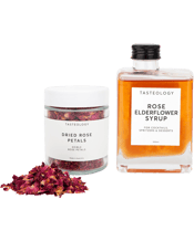  Tasteology Rose Elderflower<br>Syrup And Rose Petals   Includes premium glass bottles of:<br>1 x Rose & Elderflower Syrup (300ml)<br>1 x Dried Rose Petals Jar (20g)<br>Perfect set for flavouring and decorating cocktails<br>Store: Away from sunlight. Refrigerate syrup after opening.