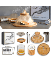 The Balmain Barmaid Smoked<br>The Smoking Culinary...  Smoked - The Smoking Culinary and Cocktail Kit includes all you need to smoke cocktails, cheese, salmon, butter, salt, olives, herbs and more when and where you like.<br>Fire up date night. Treat your guests to theatre and smokey goodness! Smoked by The Balmain Barmaid is the ultimate indulgence and gift.<br>Kit Includes:<br>1. Deluxe culinary smoker with stainless steel filter and drinks coaster top<br>2. Food grade smoking dome<br>3. Food grade smoking and serving board<br>4. Mixed wood chips