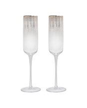  Ladelle Twinkle Champagne<br>Drink/beverage... 280ML 2pc Ladelle Twinkle Champagne Drink/Beverage Glass 280mL Set<br>Set of 2 Twinkle Champagne Glasses<br>Features a full length stem<br>With gorgeous gold detailing<br>250mL capacity<br>Comes in gift box packaging<br>Handwash only in order to preserve the gold detailing<br>Colour: Clear<br>Materials<br>Glass<br>Dimensions Approx.<br>7.4x7.4x28.3cm.<br>Includes<br>1x Twinkle 2pc Champagne Glass.
