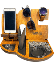  Men's Republic Bedside Table<br>Bamboo/wood Phone...  <strong>Men's Republic - Docking Station and Night Stand</strong><br>This Men's Republic docking station and night stand is the perfecet original gift for the stylish, dapper and on-trend man.<br>It offers spots to keep your wallet, coins, keys, watches, glasses and jewelry all together in one place. The phone can be charged when it is resting on the dock and there is a slot for a charger cable to pass through.<br>Finally, a home for all his accessories.<br>Made from bamboo wih faux leather<br><