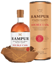  Rampur Double Cask Single<br>Malt Whisky 700ml  700ML Rampur Indian Single Malt Whiskies represent the pinnacle of luxury and craftsmanship, produced by the renowned Rampur Distillery, one of India’s oldest and most prestigious distilleries. Situated in an environment where the convergence of location, climate, and tradition play a pivotal role, Rampur Distillery crafts an exceptional range of whiskies that embody the very essence of Indian single malt excellence. Every bottle of Rampur Whisky is a testament to the distillery’s dedication to its ar