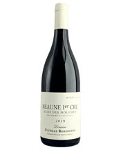  Domaine Nicolas Rossignol<br>Beaune 1er Cru... 750ML Domaine Nicolas Rossignol is a Burgundy wine estate located in Volnay, in the Côte de Beaune region of Burgundy, France. It is known for producing high-quality, terroir-driven wines with a focus on Pinot Noir. The estate follows organic and biodynamic practices in the vineyards and aims to showcase the unique characteristics of each vineyard site. The wines are renowned for their elegance, purity, and finesse, reflecting the Burgundy terroir. The domaine's vineyard holdings include prestigious a