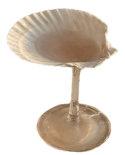  Saltist Sea Shell Wine Or<br>Cocktail Glass With...  Our handmade shell glasses are designed to sip and savour moments and zemories, to create unforgettable experiences.<br>These shell glasses have been hand crafted, and are made to enjoy however you please. Whether that be hosting drinks with friends, serving caviar or other delicacies, or used as a beautiful ornament in your home.<br>The capacity of the shells vary and is quite small compared to a usual glass. Shells are natural, so their size and shape will vary.<br>Do not use boiling water. Di