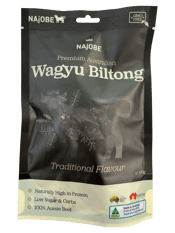  Najobe Biltong Wagyu 90g  90G Najobe Biltong has its origins from South Africa, but is produced in the in the pristine Fleurieu Peninsular region of South Australia. With our generations of farming, we select the best beef for our Biltong to ensure you get a premium product each time.<br>From the first bite, it is a Biltong that is like no other. With its soft texture, well balanced spices you will be back for more.<br>Our Biltong is slow dried, to maintain the tenderness and allows the flavour to enrich the meat. For someth