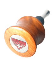  Well Stopped Stopper<br>Essendon Wine Spirit...  "See the Bombers fly up, up!<br>To win the premiership flag.<br>Our boys who play this grand old game,<br>Are always striving for glory and fame!<br>See the bombers fly up, up..."<br>The Bombers...Sheeds...Timmy...Danihers...this wine spirit bottle stopper is made in Australia. The timber used is native timbers locally sourced. The stainless steel is grade 316 food rated, the rubber seals are also food rated and will not break down over time!<br>You can choose either cone shaped (WSS-01) or tear