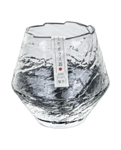  Solkatt Designs Japanese<br>Style Snowflake Whisky...  Transform your whisky tasting with the Japanese Style Snowflake Whisky Glass. This exceptional piece blends style and function, featuring a unique shape and frosted surface that adds sophistication to any occasion. Renowned for enhancing the whisky experience, it captures and diffuses rich aromas for a fuller sensory delight. Ideal for chilled drinks, its heavy bottom and thick glass accommodate ice or whisky stones. Thoughtfully packaged in a wooden box.