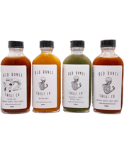  Old Bones Chilli Co The<br>Saucy Taster Pack   Your gateway&nbsp;bundle&nbsp;to OB's gourmet range. &nbsp;<br><br /><br />The perfect gift for a chilli head who's just begging to wake up to the OB life, get your mates on the bandwagon&nbsp;with&nbsp;a cheeky taste of each of our 4 best-selling sauces before you commit to a full-sized bottle.<br><br /><br />Enjoy<br><br /><br />Smoked Garlic Chilli Sauce 100mL<br><br /><br />Perfectly balanced with a meaty garlic punch, this is a full flavoured sauce with a mild palatable burn. Your one stop