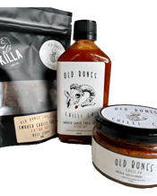  Old Bones Chilli Co The<br>Hotter Bundle  200ML Kick it up a notch with The Hotter Gift Pack, the perfect gift for the chilli head that's looking for a bit of spice! Just like a slap across the face, this one is gonna burn. It features<br>1 x 200mL Smoked Garlic Chilli Sauce Extra Hot<br>Perfectly balanced with a meaty garlic punch, this is a full flavoured sauce with an extra bite. Your one stop shop to spicing up breakfast, lunch, dinner and everything in between, crank up the heat, add a ziggy garlic twist and make this your new secret ing