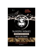  Nungra Nibbles Beef Biltong<br>Original Safari 85g  85G The classic flavour you’ve been asking for – introducing our Original Safari Biltong! With a simple, no-frills seasoning of salt, finely ground black pepper, and a subtle hint of toasted coriander seeds, this biltong brings you the pure taste of premium beef. No sweetness, no heat – just the bold, authentic flavour of the meat itself.<br>Perfect for those who prefer their biltong without extra flavours or spice, this mild and savoury snack is a true favourite.<br>85g Net Weight per Bag.<br>Nungr