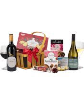  Interhampers Ideal Gift<br>Hamper  750ML BEAUTIFULLY HAND CRAFTED 2 TONED WOODEN BASKET<br>Avon Brea Eden Valley Chardonnay 750ml<br>Wolf Blass Shiraz-Grenache 750ml<br>Bisko Traditional Shortbread Festive Shapes 250g<br>Cafe Adore Black Forrest Delights 170g<br>Borelands Macadamia Shortbread 125g<br>Charlie's Fine Foods Chocolate Chip Bites 110g<br>Ferrero Rocher 3pce Pack<br>Gourmet Nougat Almond &amp; Cranberry 100g.