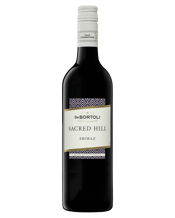  De Bortoli Sacred Hill<br>Shiraz  750ML This Shiraz displays rich, lifted aromas of dark fruits and spice. The palate is silky, with soft tannins and red berry flavours enhanced by a touch of peppery spice. Serve with pasta, lamb or venison. Four generations.