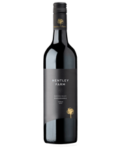 Hentley Farm Marananga<br>Shiraz 750ML Our Marananga Shiraz is a true reflection of provenance. Here, sun-drenched vineyards and ancient soils converge to produce bright, fruit-driven flavours that speak to the rich essence of our land. Crafted with precision to enhance the natural elegance of the region, each bottle encapsulates the heritage and tradition of our winemaking legacy — a harmonious expression of quality, tradition, and terroir.