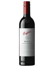 Penfolds Bin 2 Shiraz Mataro<br>2014 750ML 82% shiraz and 18% mataro (mourvedre) from a big red year. The plummy colour of youth and baby fat have hardly diminished at all. Typically Penfolds, typically fully flavoured, if a little restrained, with a medium to full body. Meaty mataro aromas distinguish themselves at first sniff. Deeper analysis reveals elements of dusty dried herb over licorice and chocolate flecked dark berry fruit. Pepper spice is prominent on the finish. No need to cellar any longer, but if you forget to drink it over