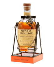 Monkey Shoulder Scotch<br>Whisky Cradle... 700mL Rooted in Malt whiskey history, and inspired by the malt men who still turn the malting malting barley by hand, 'Monkey Shoulder' is blended in small batches from three of Speyside's finest single malt whiskies to achieve a smoother, richer taste.