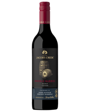  Jacob's Creek Double Barrel<br>Shiraz 2015  750ML Double Barrel Shiraz has a full and generous palate with a beguiling mix of sweet red fruits and dark chocolate indicative of its origins as Barossa Shiraz. Subtle toasty vanillin derives from aging in traditional French and American oak wine barrels. The careful use of aged Scotch whisky barrels for finishing has added complex nuances of almond-husks and also softened the dense tannins to yield an incredible smoothness.