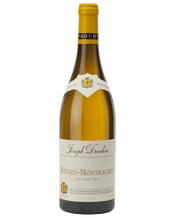 Joseph Drouhin Bâtard<br>Montrachet Grand... 750ML Founded in 1880, Maison Joseph Drouhin is one of Burgundy’s most prestigious family-owned houses. Now led by the fourth generation, the estate is defined by a signature style of effortless elegance. Their 100-hectare domain is farmed entirely using organic and biodynamic practices, spanning the region's most iconic Grand Cru and Premier Cru plots. From the legendary Montrachet Marquis de Laguiche to their accessible regional classics, Drouhin wines are celebrated for their purity, finesse, and t