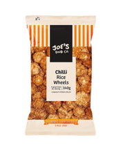  Jc's Chilli Rice Wheels 140g<br> 140G Joe’s Food Co. Rice Wheels Chilli are light, crunchy, and packed with a bold chilli kick. Made from puffed rice and perfectly seasoned, these bite-sized wheels deliver a satisfying crunch with just the right touch of heat. A tasty snack for lunchboxes, sharing, or whenever you’re craving something a little spicy.