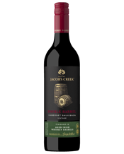 Jacob's Creek Double Barrel<br>Cabernet Sauvignon... 750ML The complex palate reveals itself with style. Traditionally assertive Coonawarra tannins are evident at first, before giving way to a mid palate filled with ripe cassis, olive tapenade and complex briary hints. Fine, dusty tannins give excellent line and length, and are layered with sweet and toasty characters reminiscent of crème brûlée. Our unique Double Barrel technique of finishing in aged Irish whiskey barrels has integrated the myriad of flavours and brought extra richness to the palate.