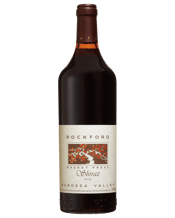  Rockford Basket Press Shiraz<br>2005  750mL Almost black in colour this Shiraz displays ripe plums blackberries and a touch of cool-climate pepper on the nose. Rich and flavoursome there are elements of leather and spice as well as lovely full sweet fruit.
